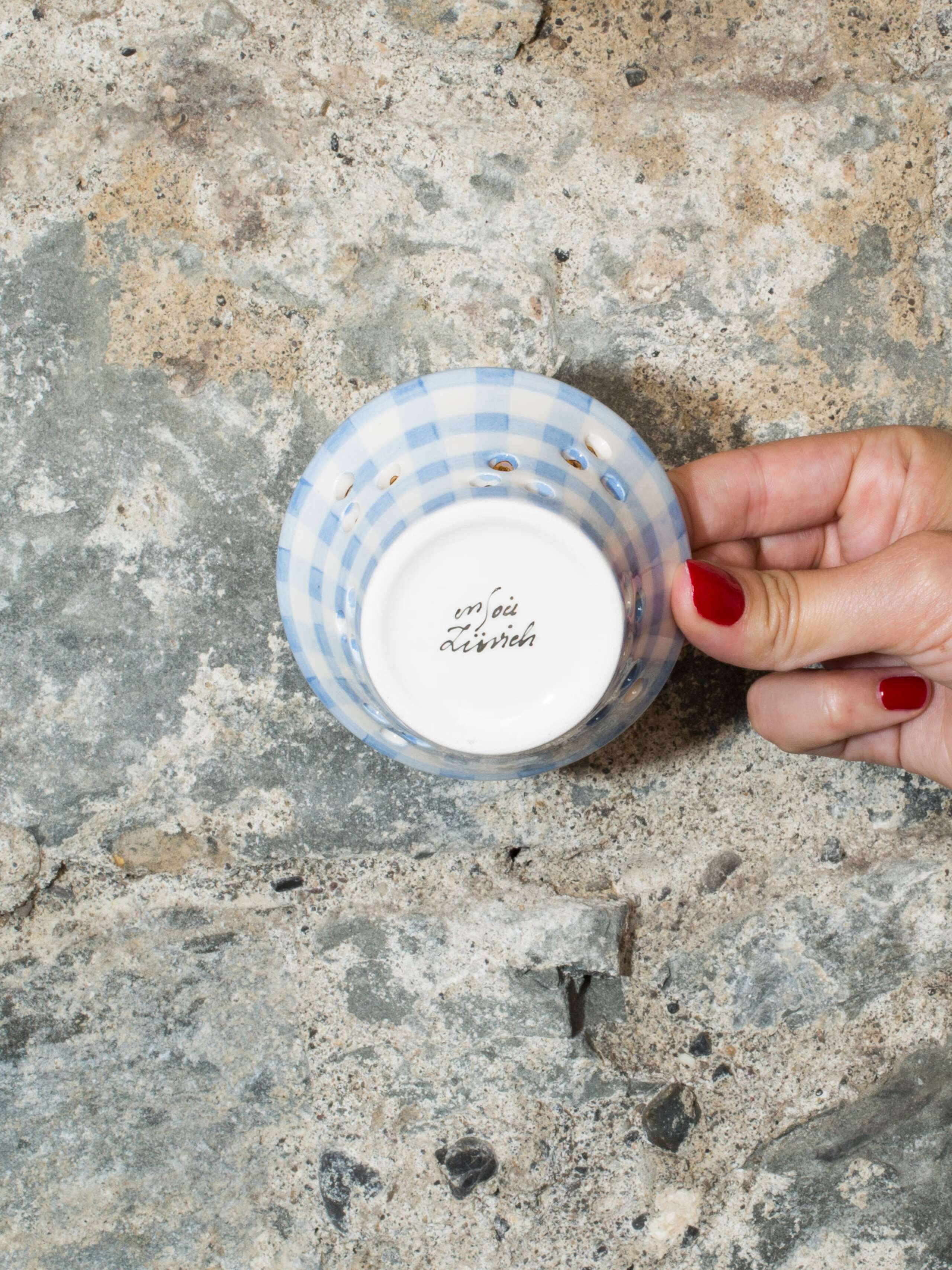 person holding tealight