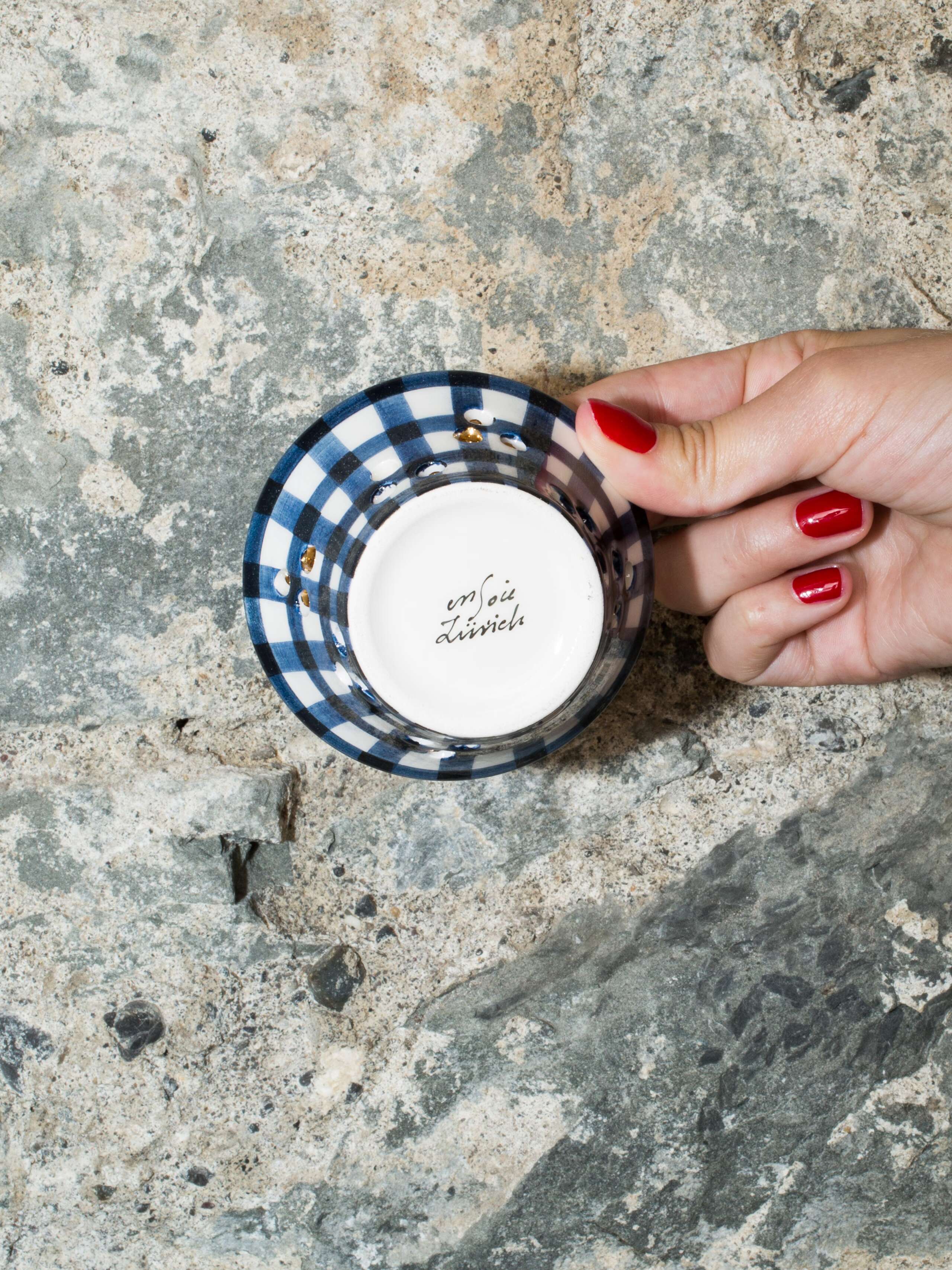 person holding tealight