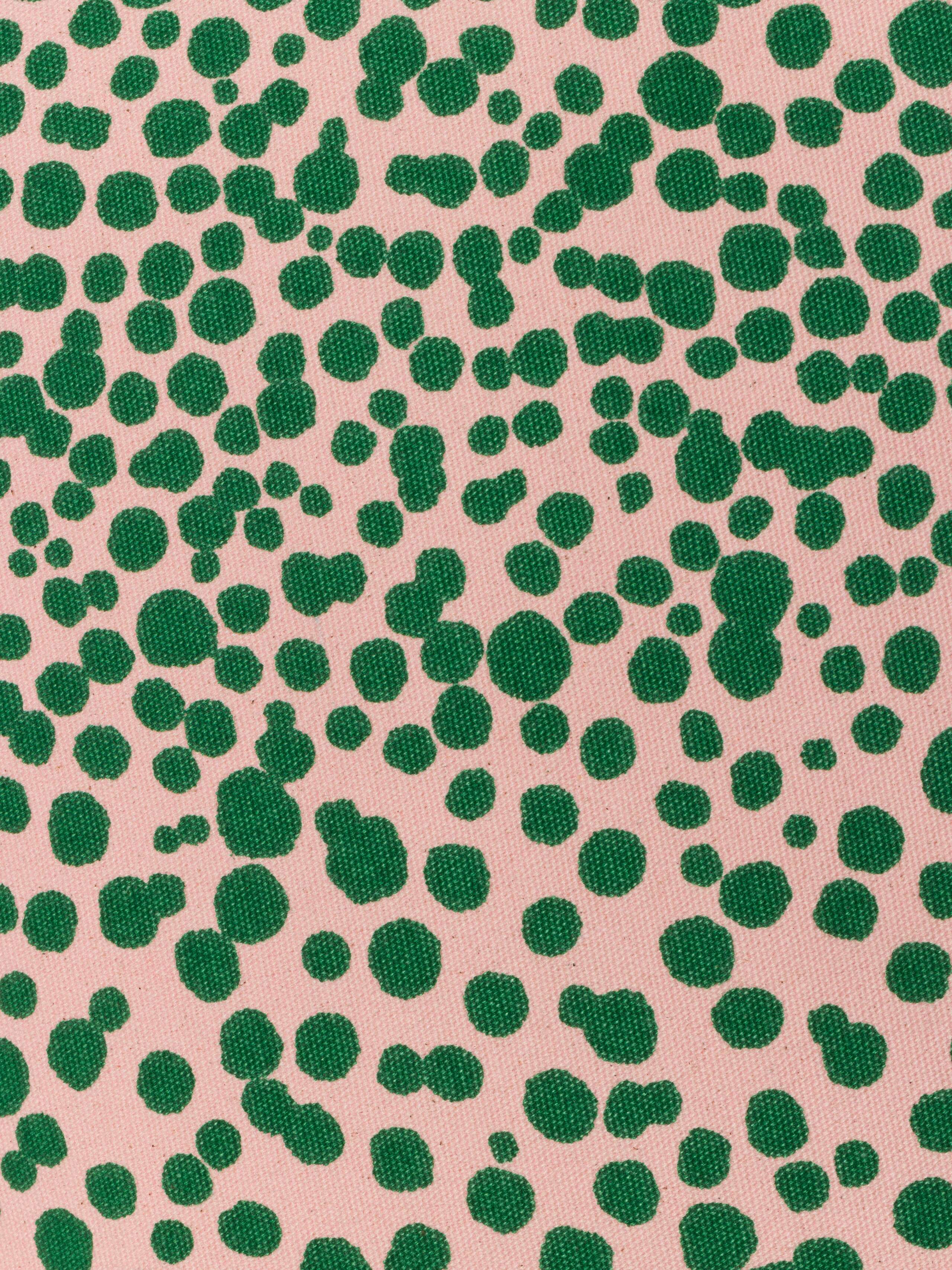pillow cover in pink with green leo dots detail shot