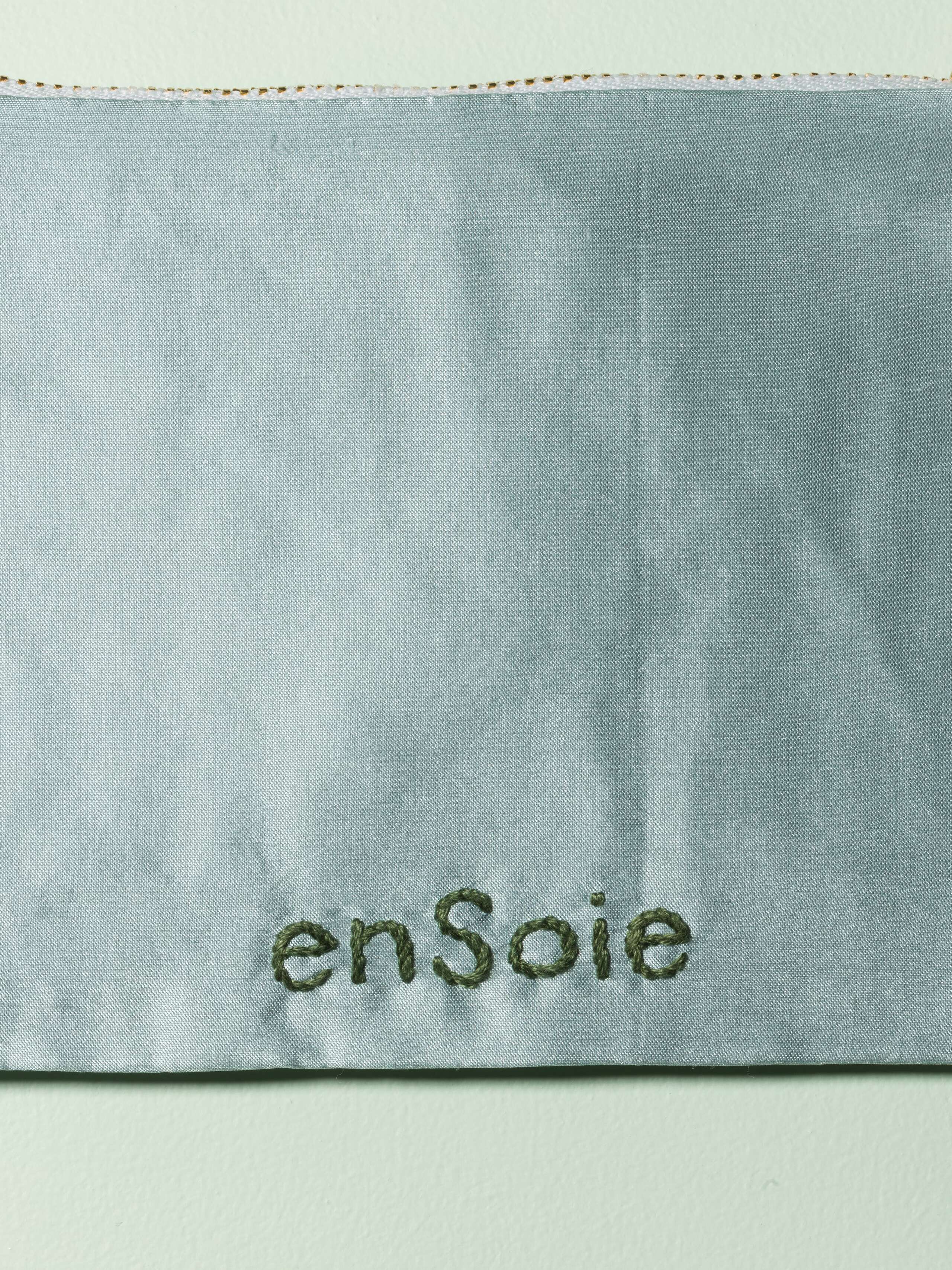 Beautiful silk clutch, Love rules forever embroidery enSoie embroidery, green embroidery on glossy light blue silk