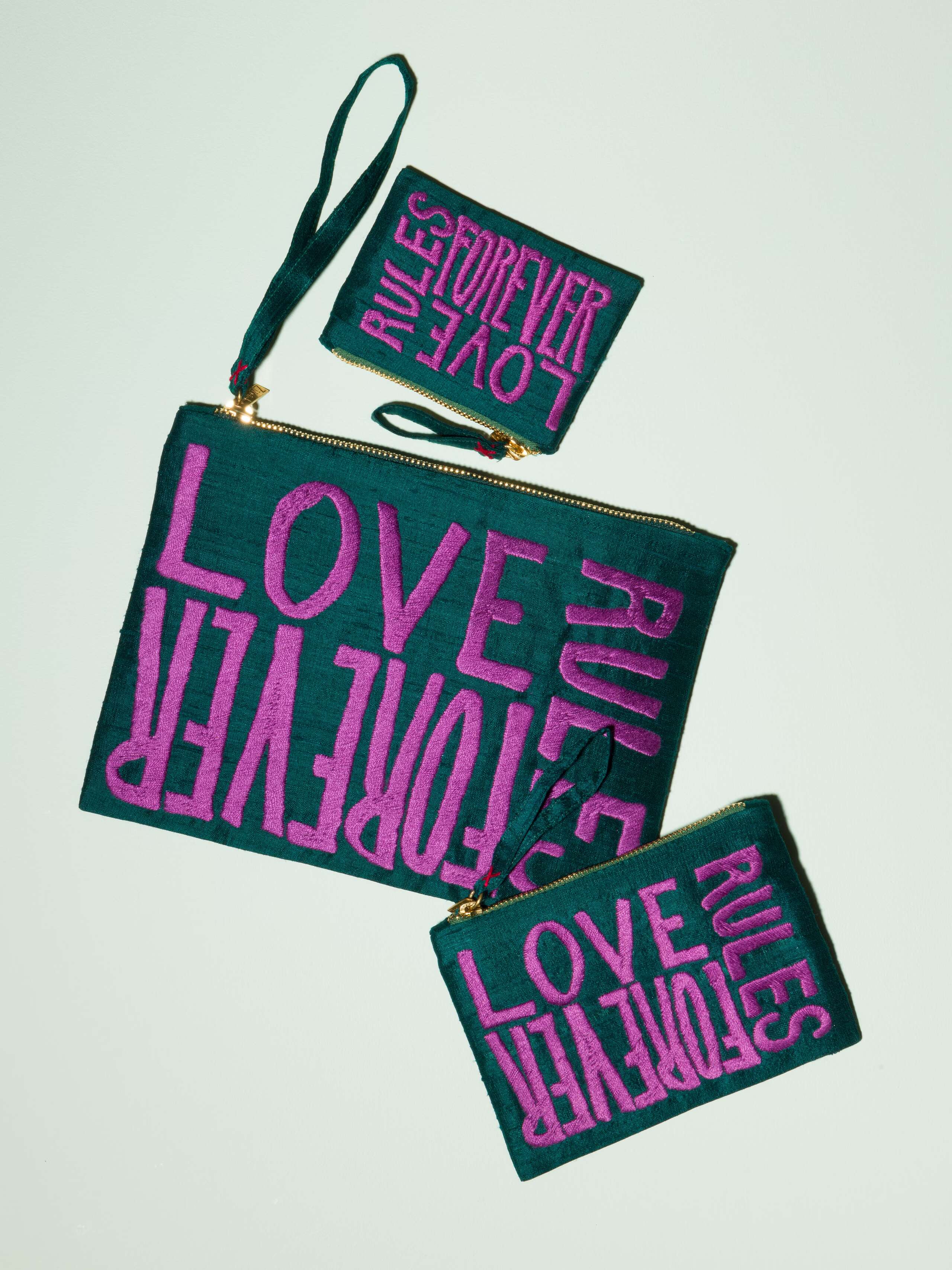 Beautiful silk clutch, Love rules forever embroidery enSoie embroidery, purple embroidery on glossy dark green silk