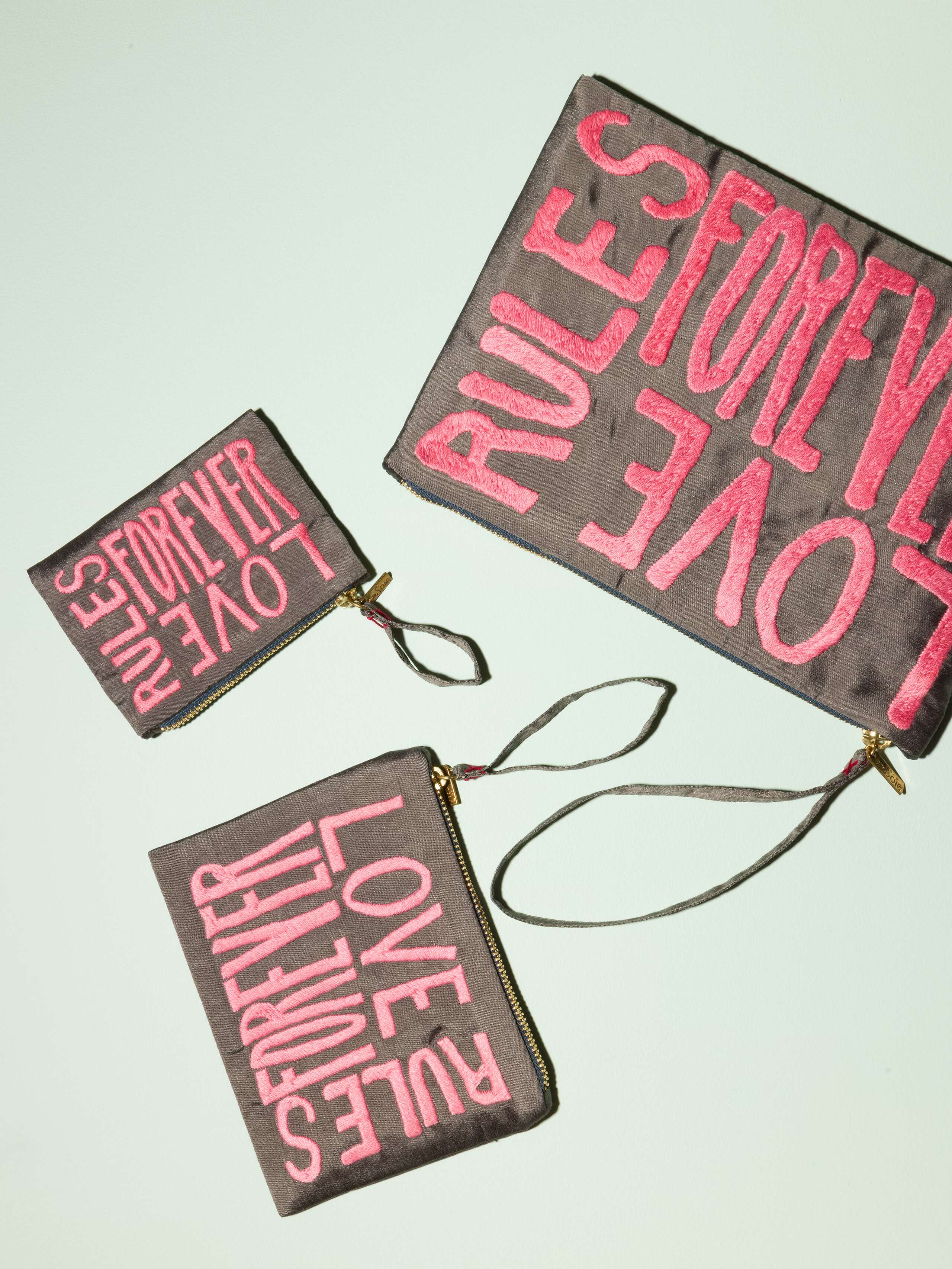 Beautiful silk clutch, Love rules forever embroidery enSoie embroidery, pink embroidery on glossy grey silk