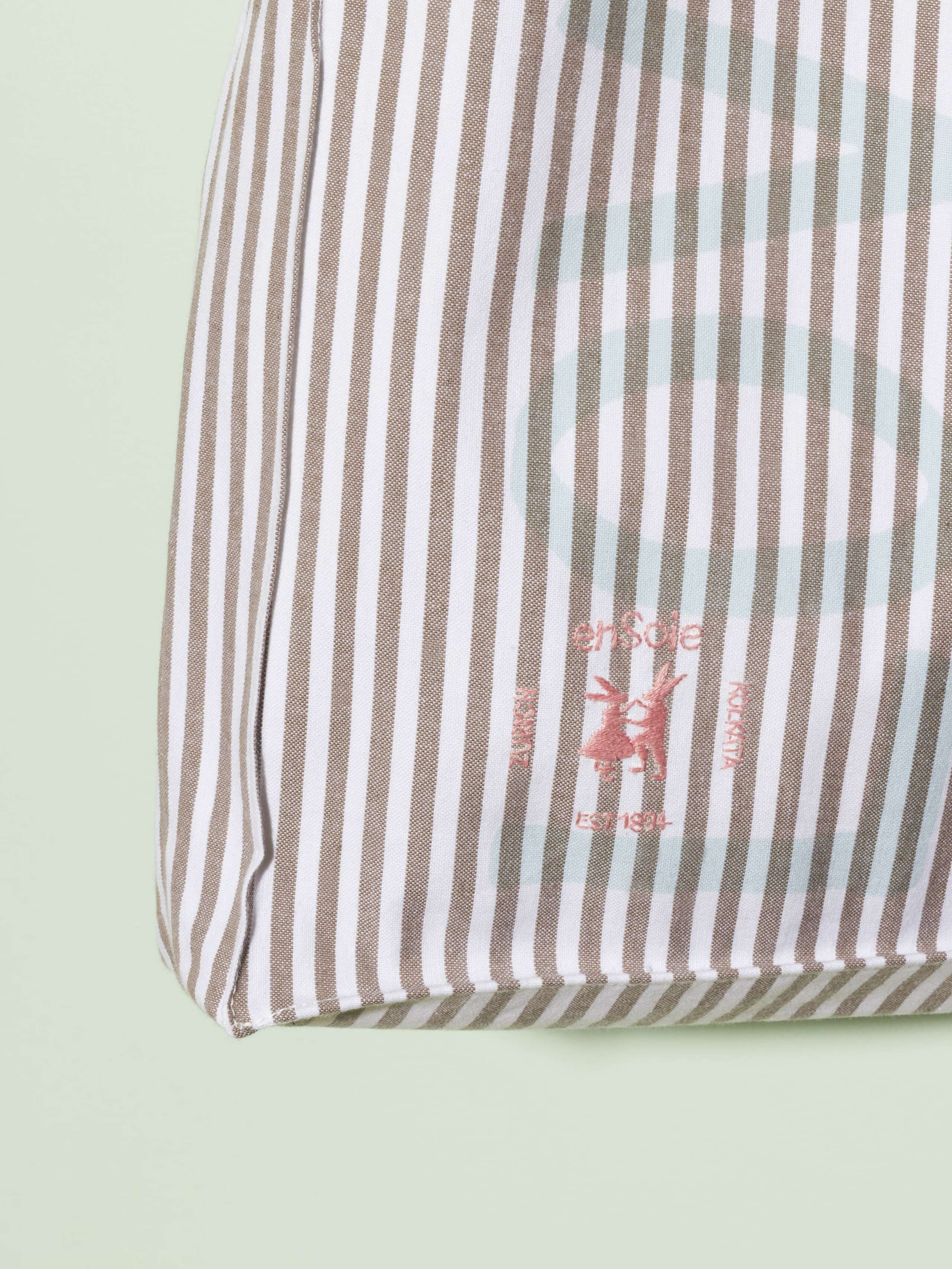  cotton tote bag with a beige stripe pattern and a mint print that says "Love rules forever" and a rabbit ebroidery