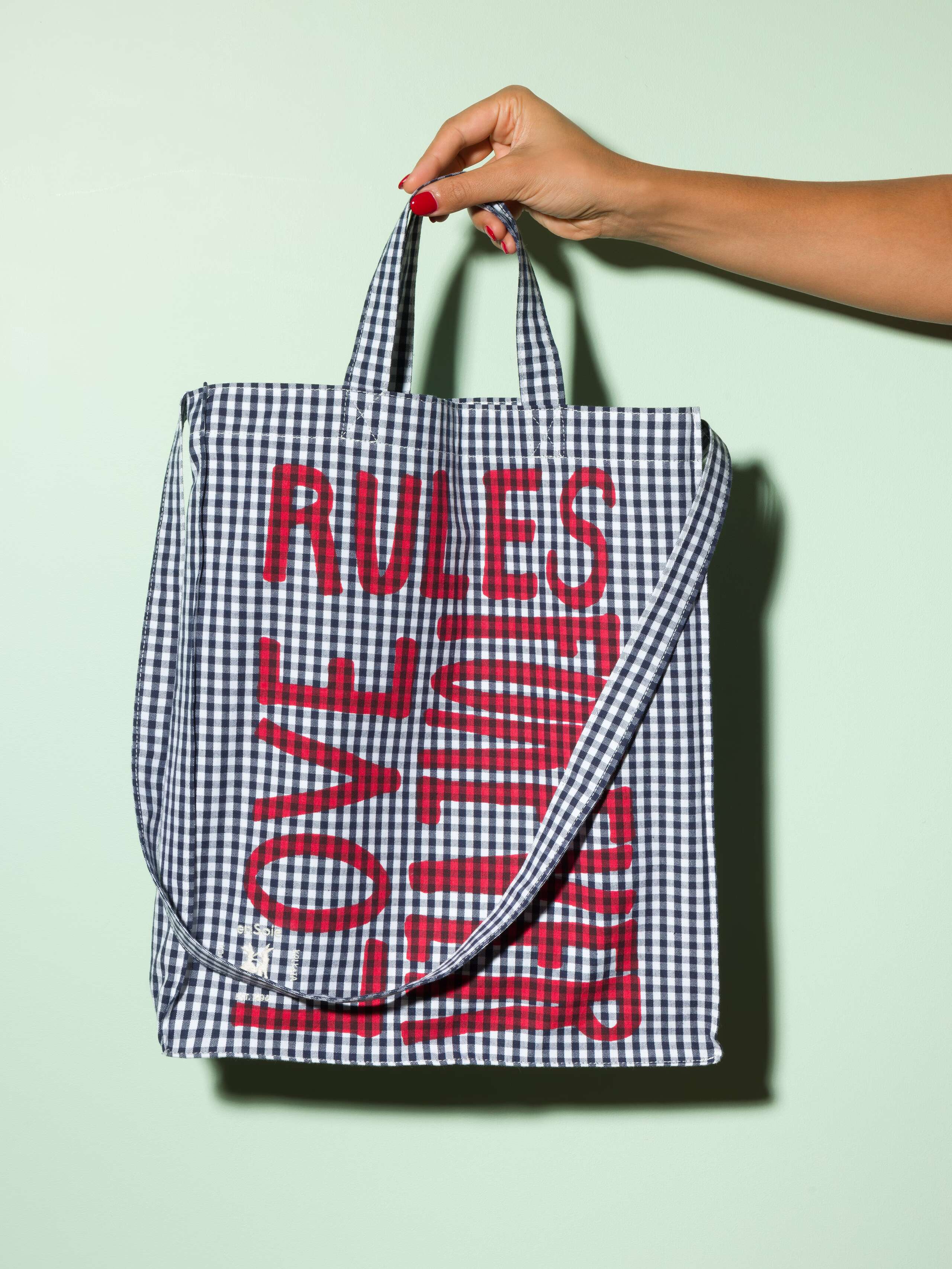  cotton tote bag with a navy vichy pattern and a red print that says "Love rules forever" and a rabbit ebroidery
