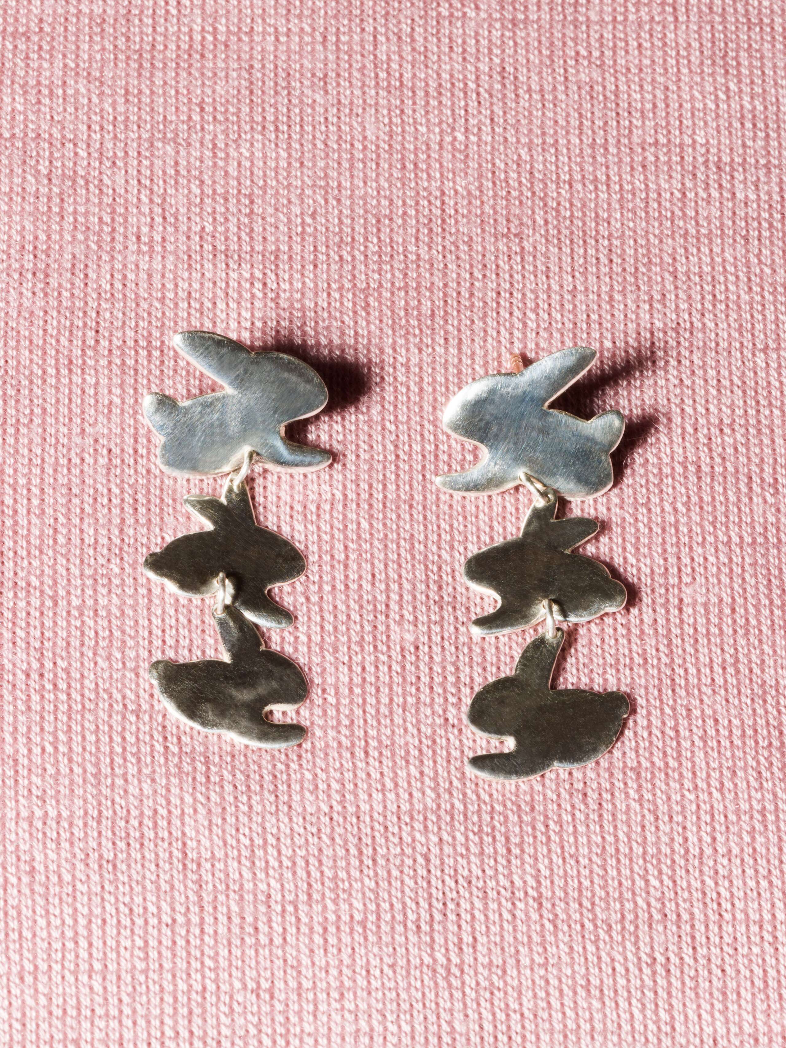 Silver ear studs with three cute rabbits