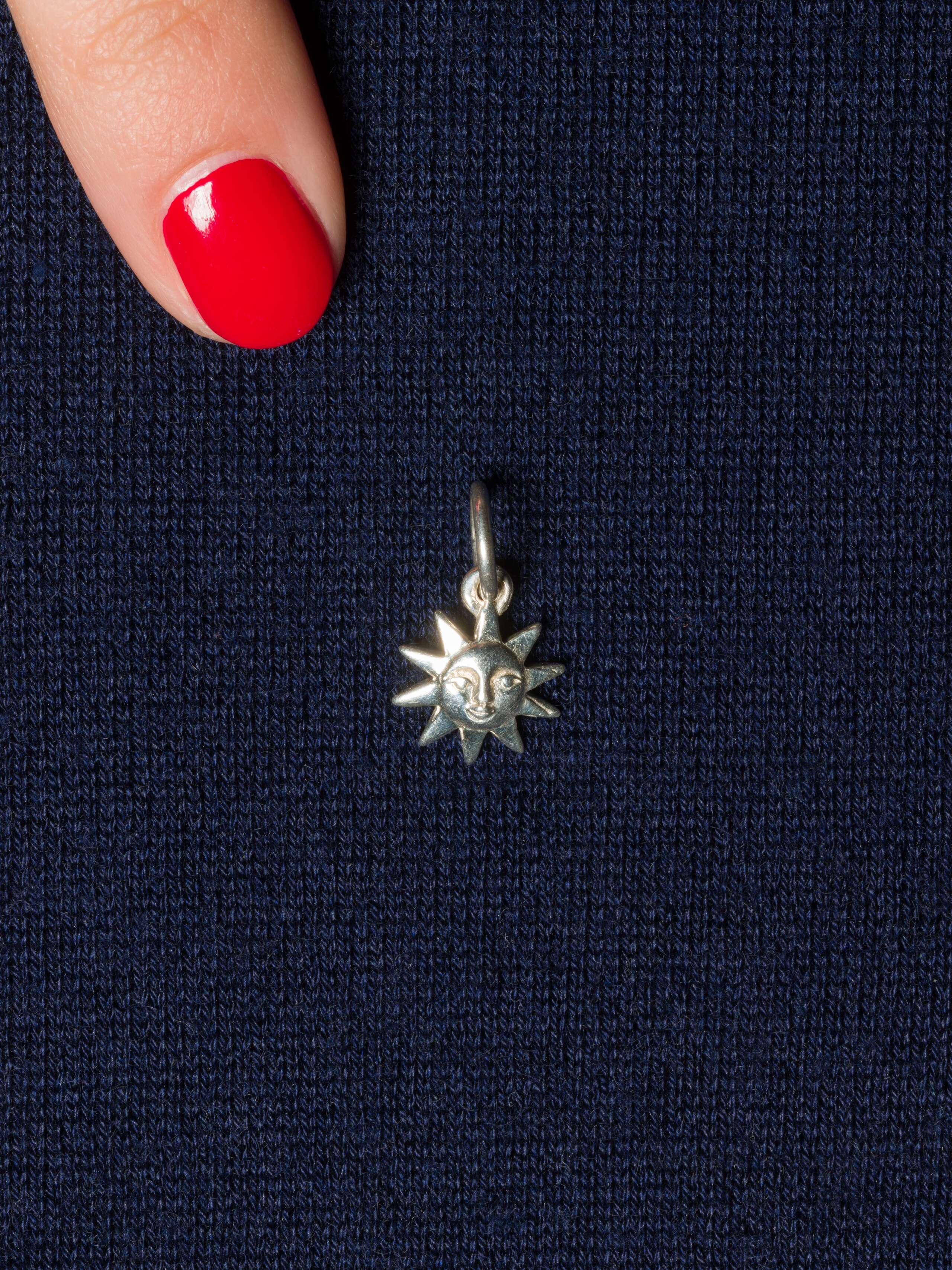 Picture of a sun pendant made of silver