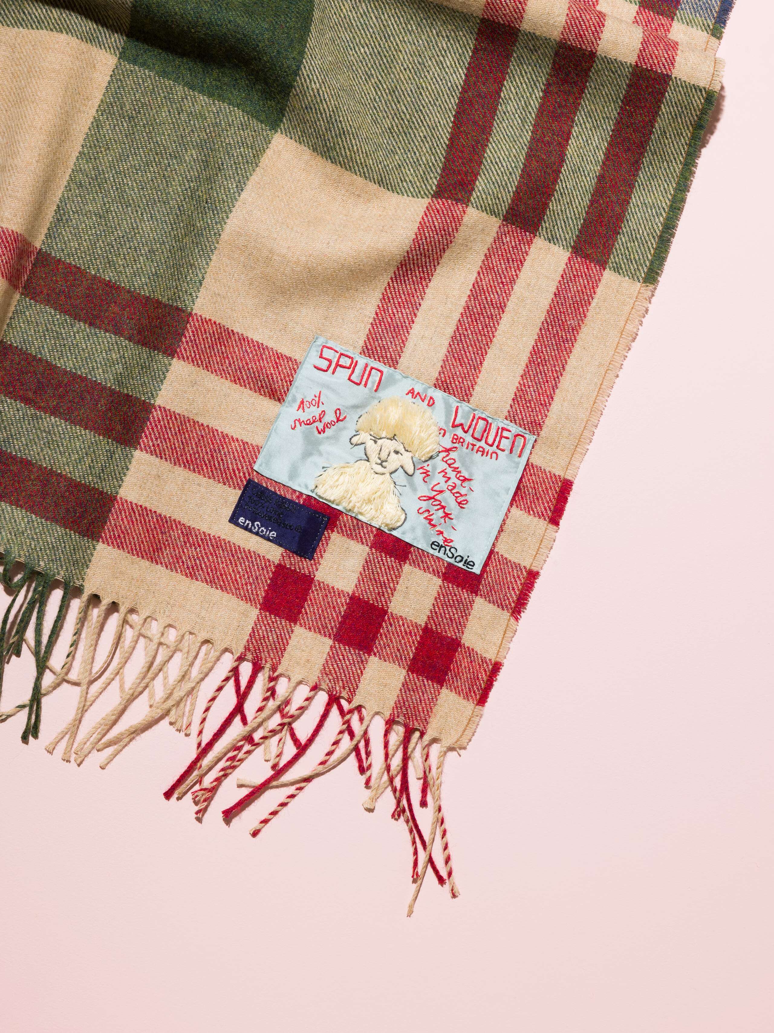 Picture of a detail of a coulourful handmade wool blanket 