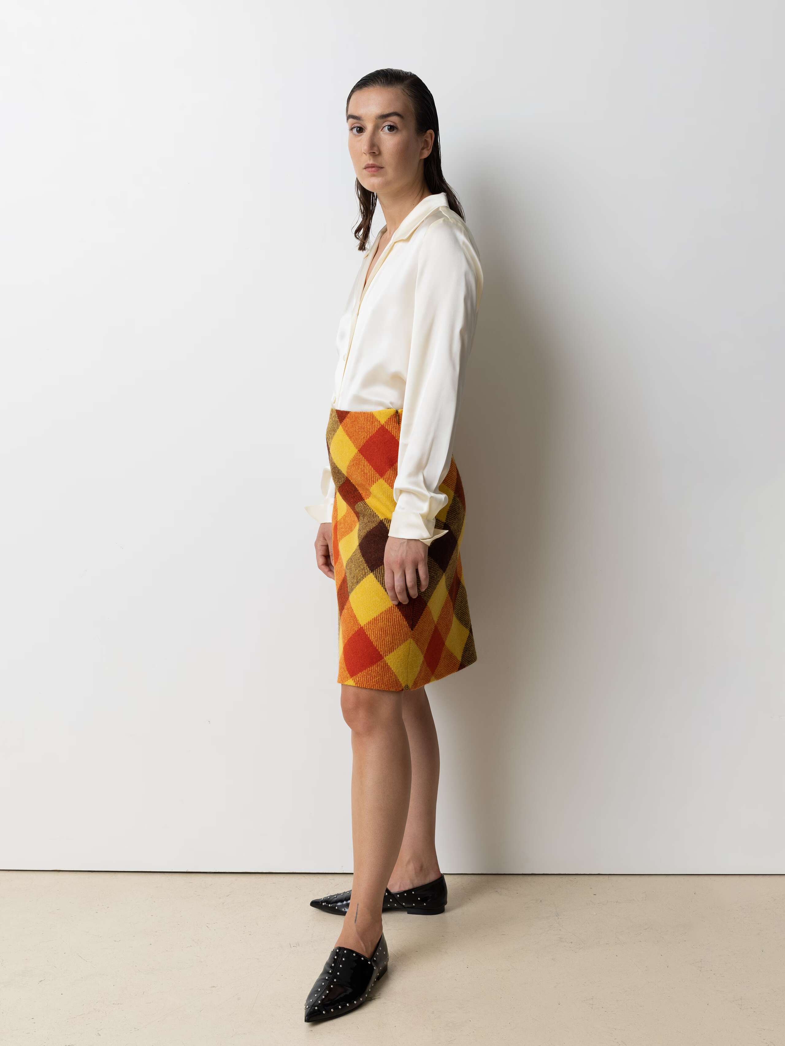 Picture of a female model wearing a wool skirt