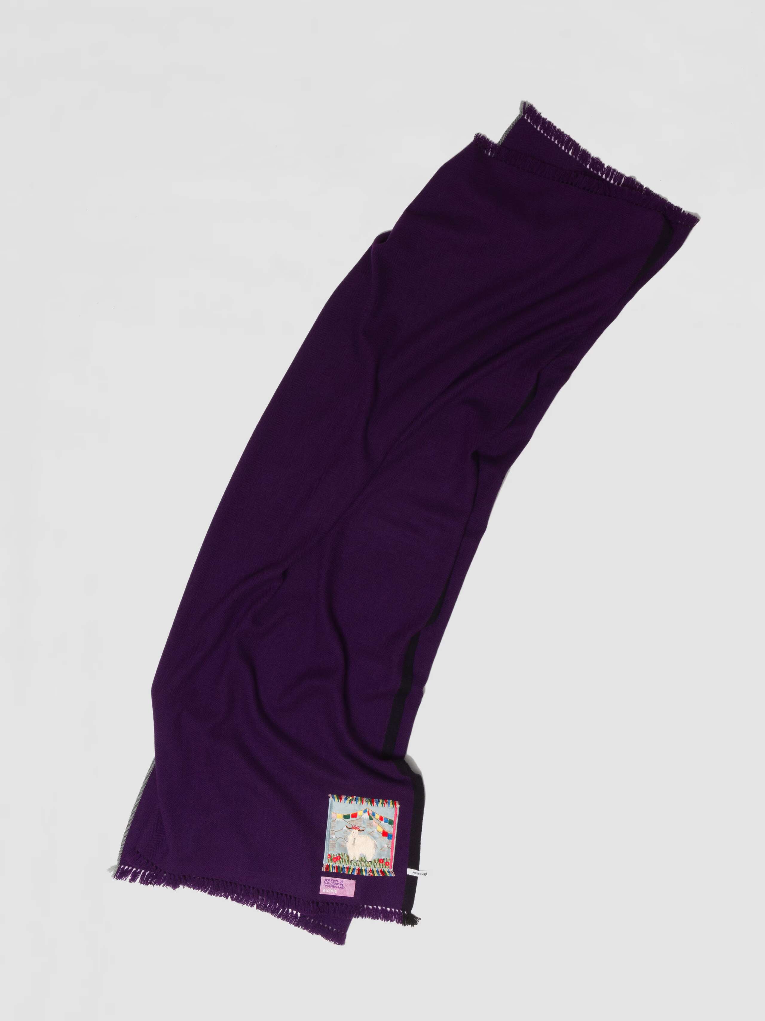 Picture of a beautiful cashmere stole in a deep purple shade
