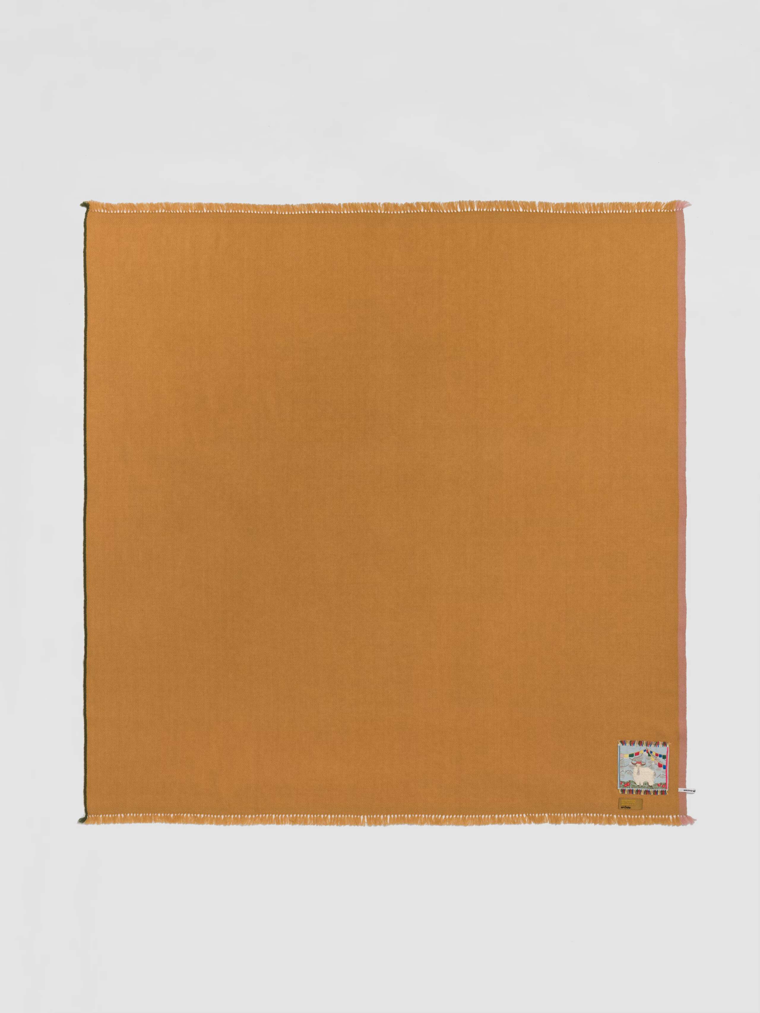 Picture of a warm yellow cashmere scarf