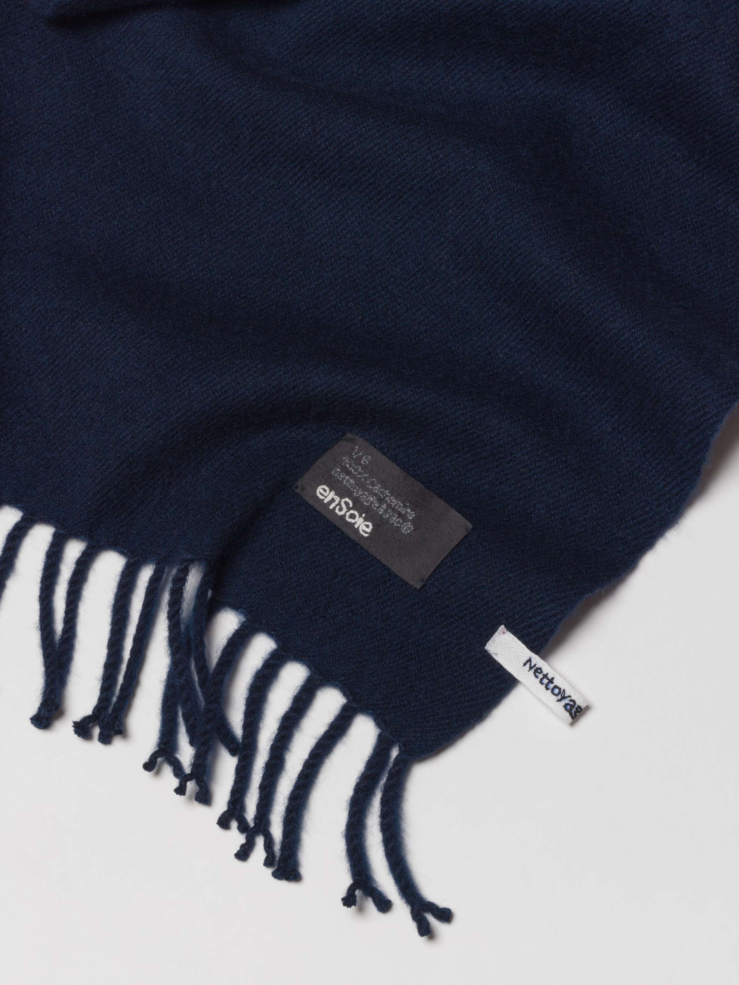 Picture of a detail of a navy blue cashmere stole